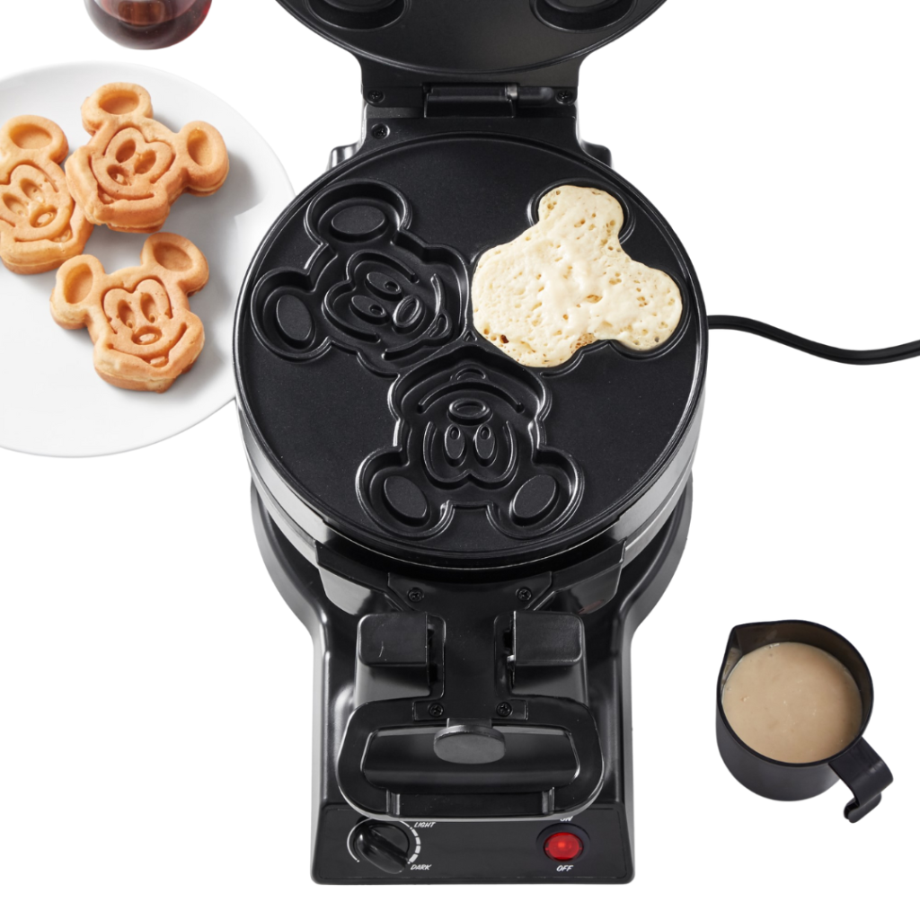 Black Mickey Mouse waffle maker with classic Mickey-shaped waffles.