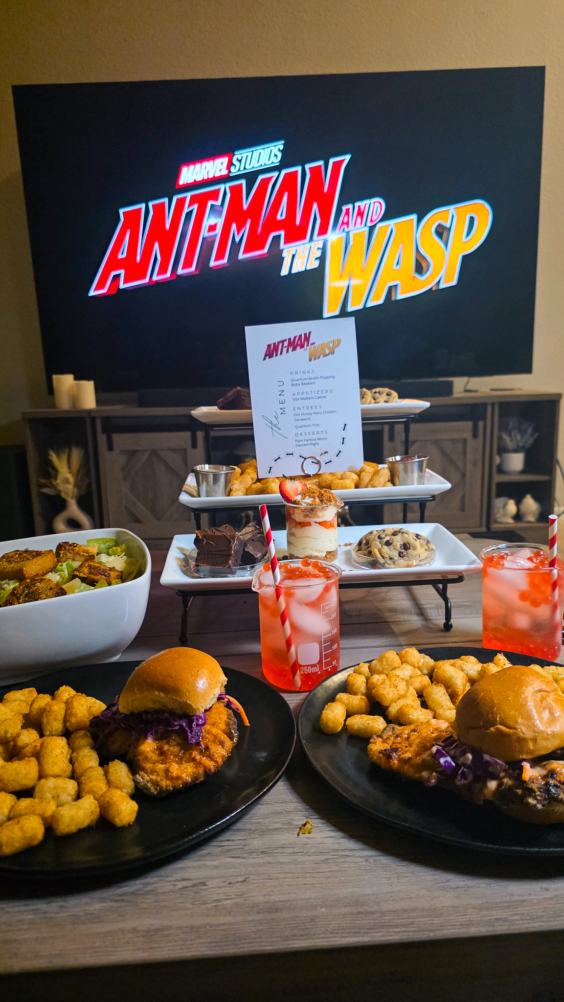 Ant-Man and the Wasp dinner and movie night full spread with title screen on TV