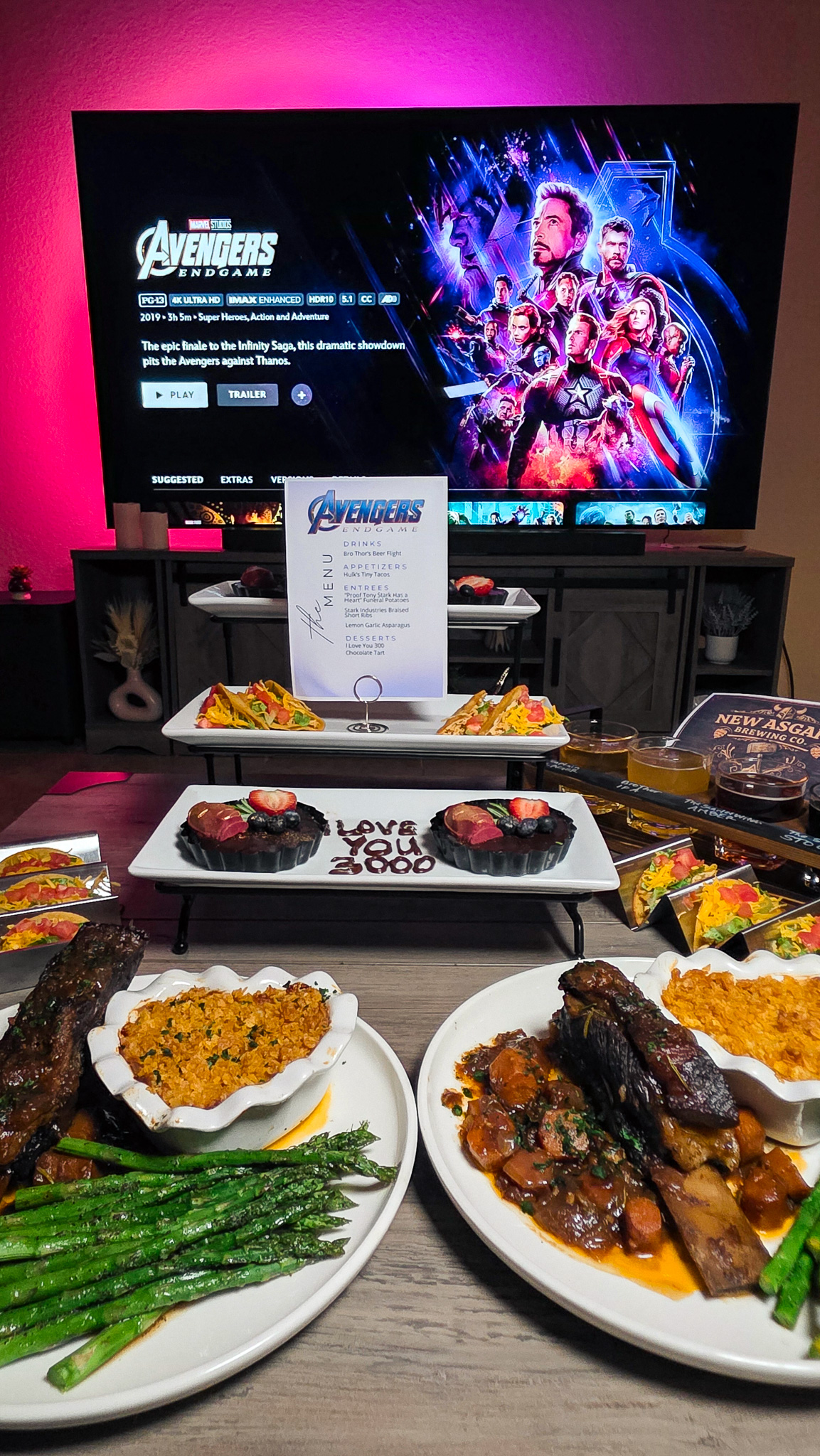 Avengers Endgame full dinner spread with short ribs funeral potatoes chocolate tarts tiny tacos and beer flight on movie night
